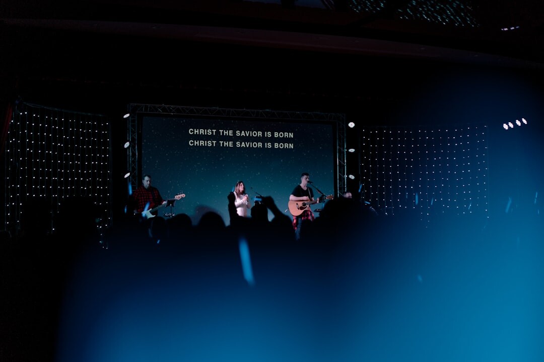 Panel of speakers on stage during a corporate summit